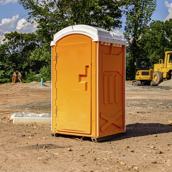 how often are the porta potties cleaned and serviced during a rental period in Ames Lake